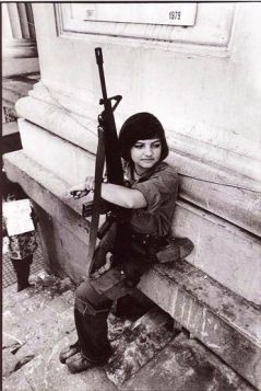 Young female soldier at Carlos Fonseca's funeral, Managua 1979